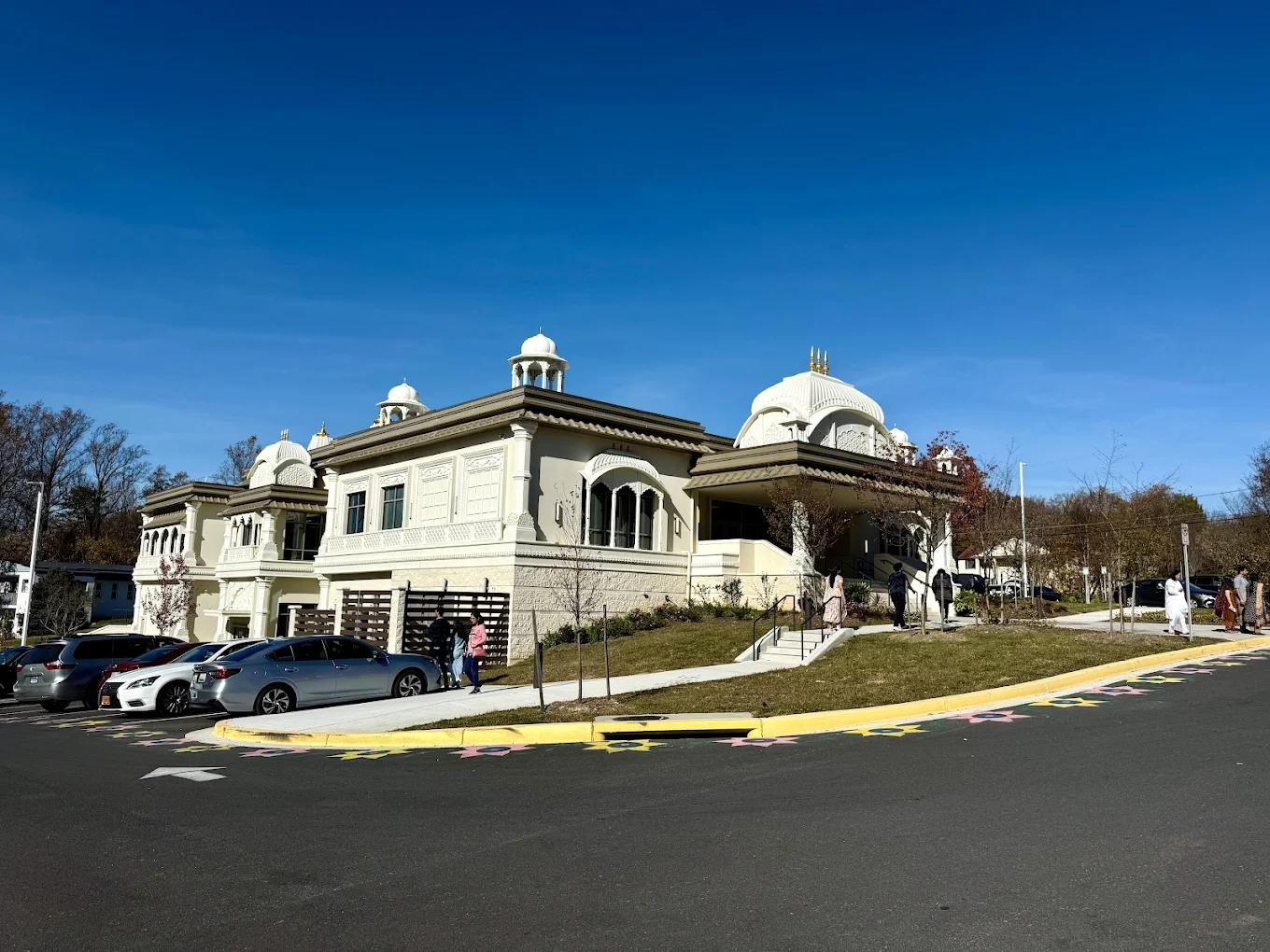The white-domed ISKCON temple near Washington, D.C. beneath a clear blue sky